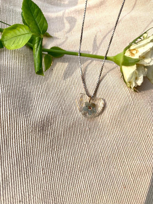 Divine Devotion Resin Heart Pendant